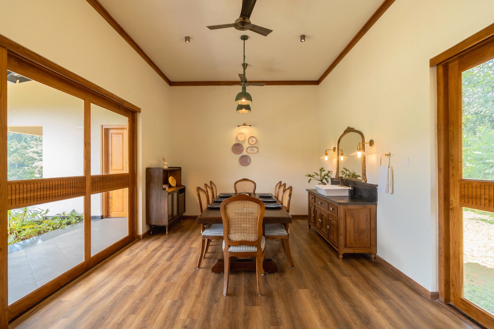 Warm timber interior beside wide garden windows