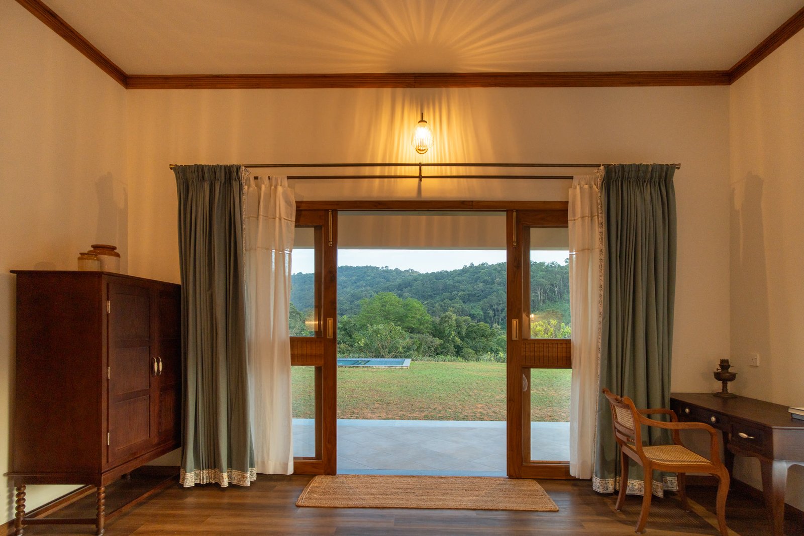 Bedroom doors opening onto the private lawn